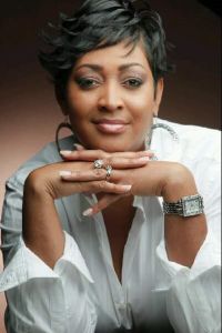 Keeshea Pratt closeup with hands clasped promotional image