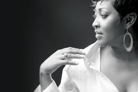 Keeshea Pratt looking over shoulder bw promotional image