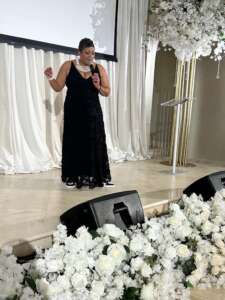 Keeshea Pratt singing at formal event